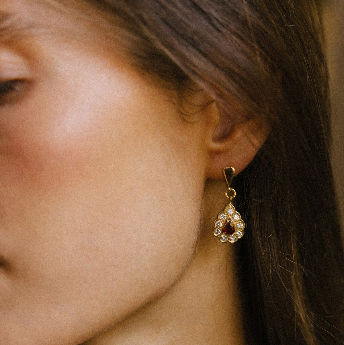 Pair of yellow gold earrings with diamonds and rubies
