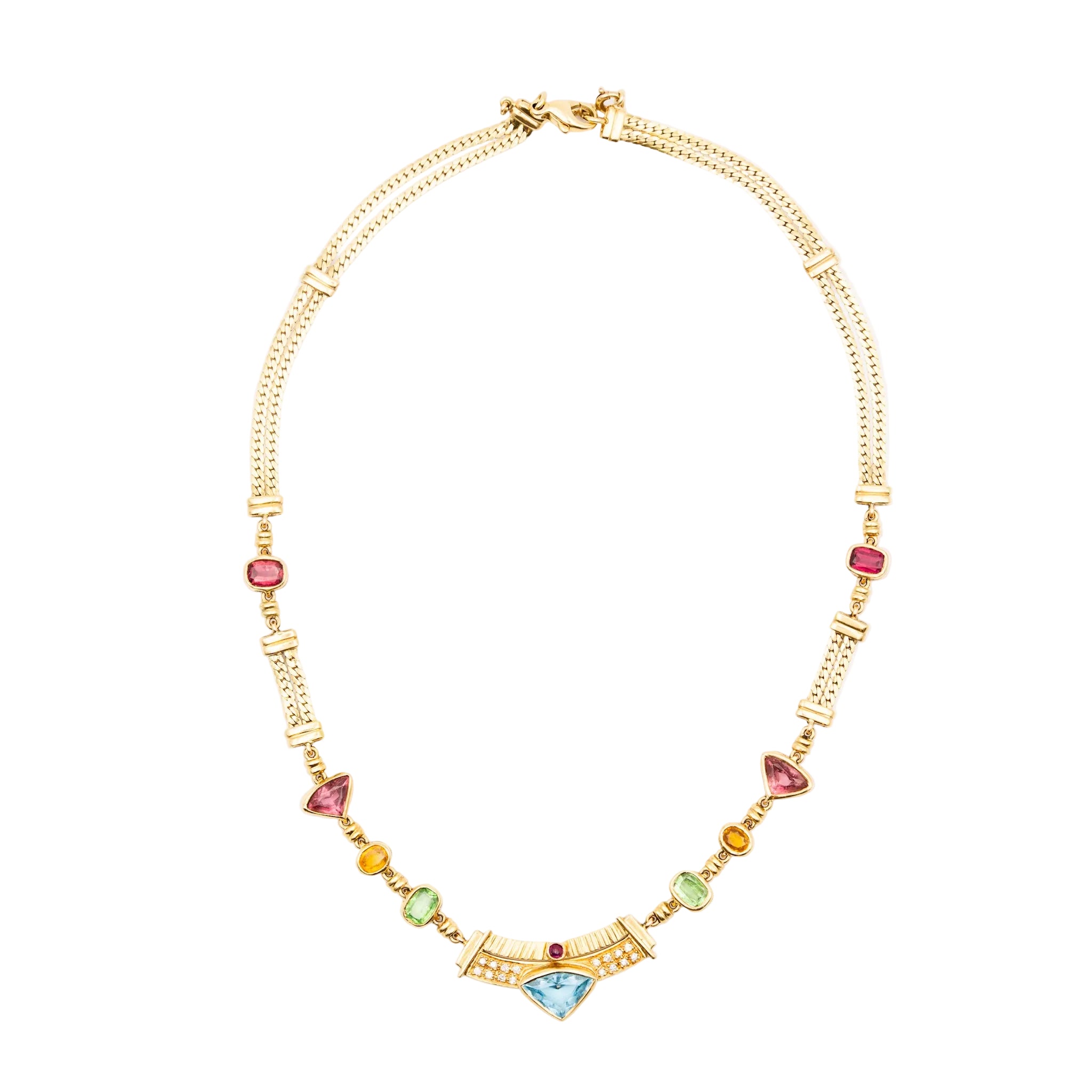 Necklace in yellow gold, citrines, garnets, peridots, blue topaz, pink tourmalines, rubies and diamonds.
