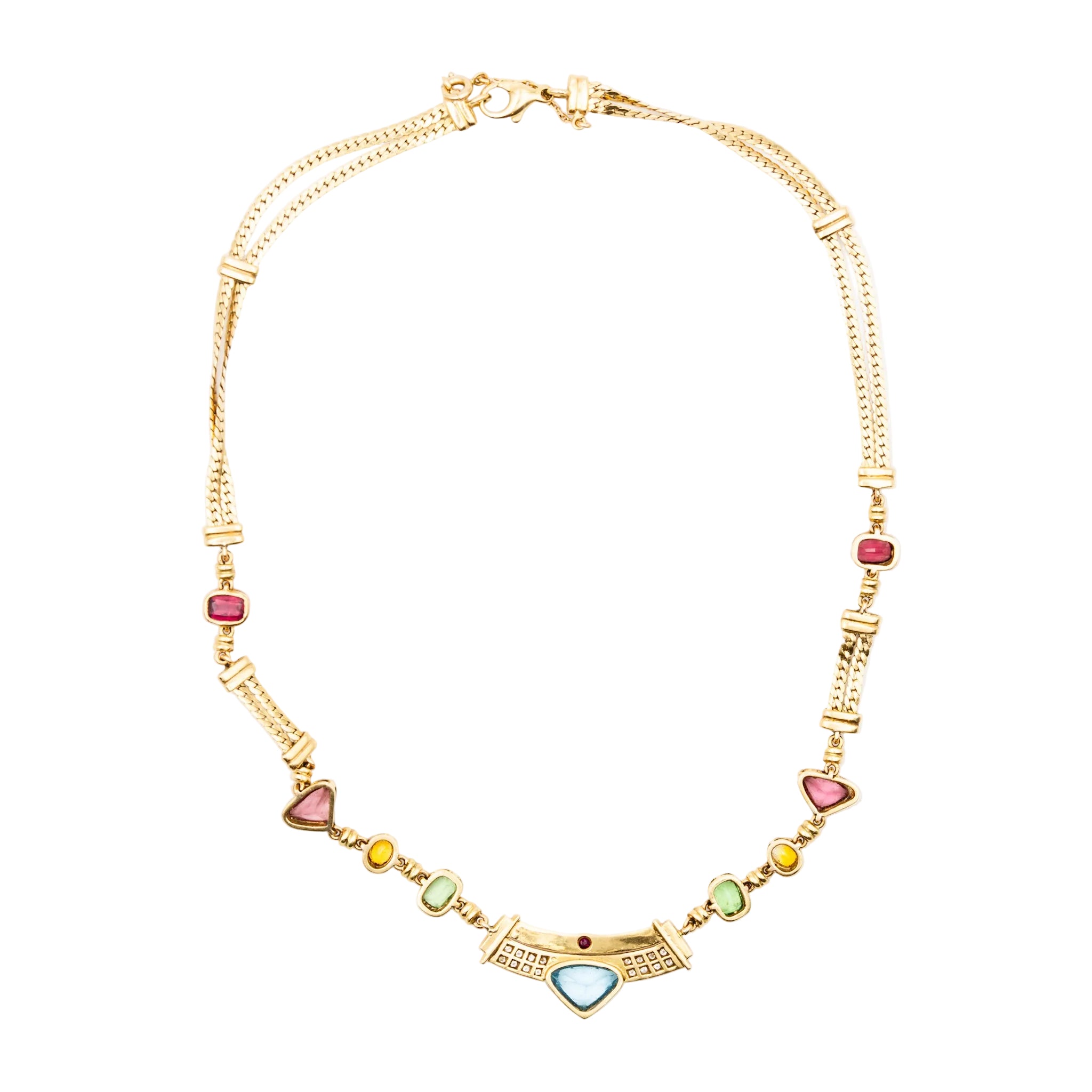 Necklace in yellow gold, citrines, garnets, peridots, blue topaz, pink tourmalines, rubies and diamonds.