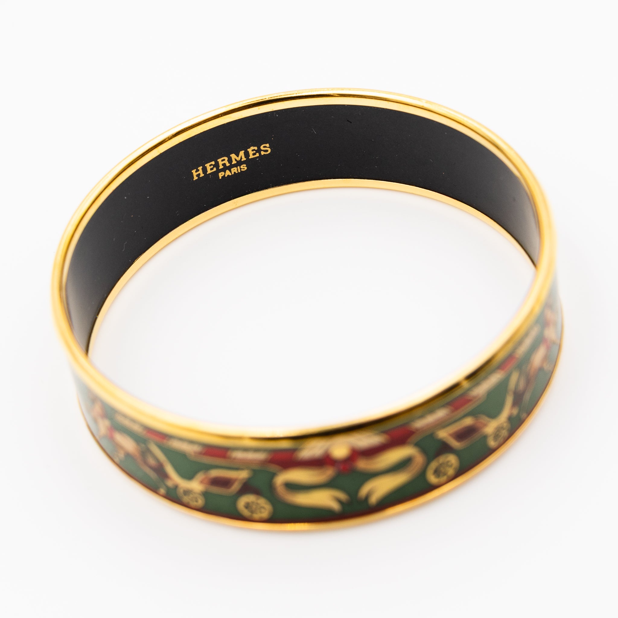 Bracelet and HERMÈS ear clips in gilded metal and enamel