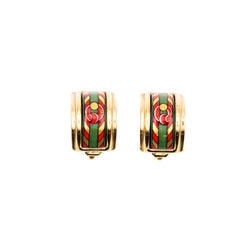 Bracelet and HERMÈS ear clips in gilded metal and enamel