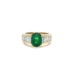 Ring emerald set half-closed