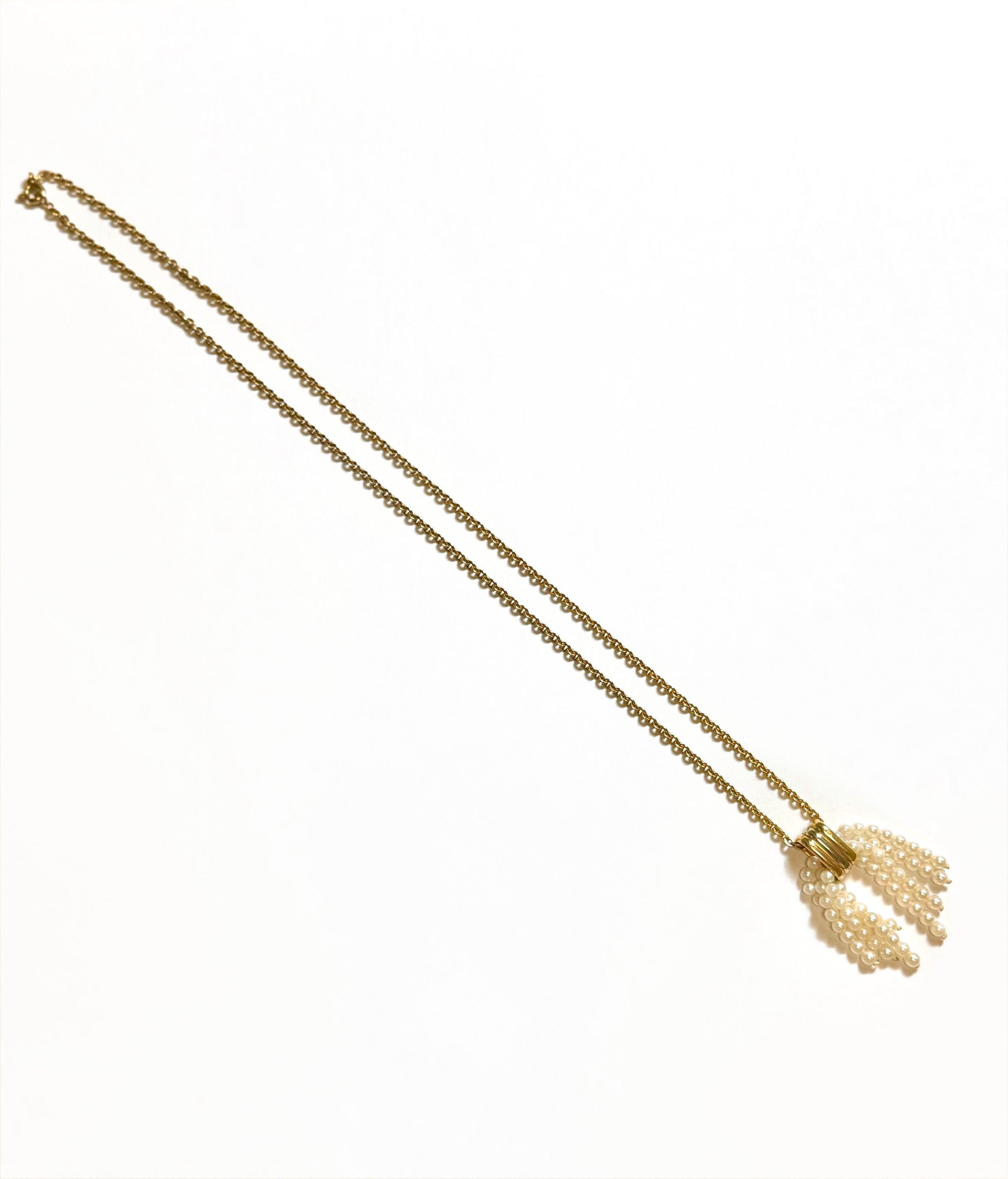 Pendentif pompon de perles de Cartier
