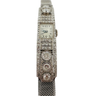 Montre de dame en or blanc et diamants