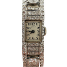 Montre de dame en or blanc et diamants