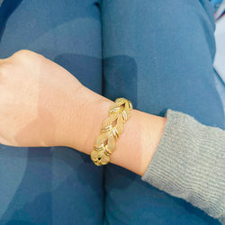 Articulated mesh bracelet in yellow gold