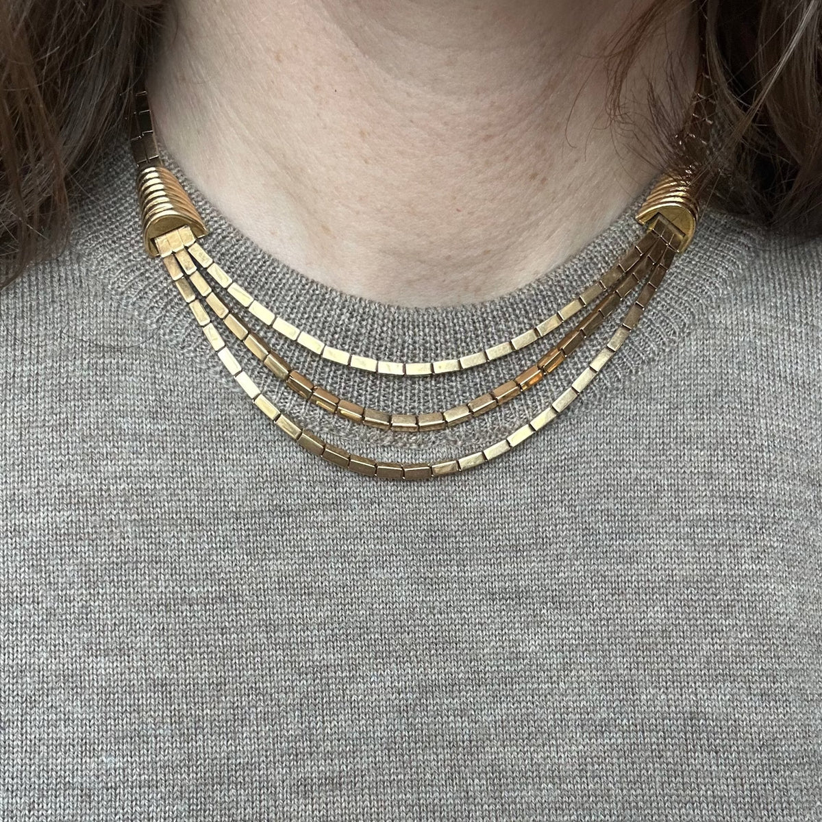 Necklace three-row articulated gold