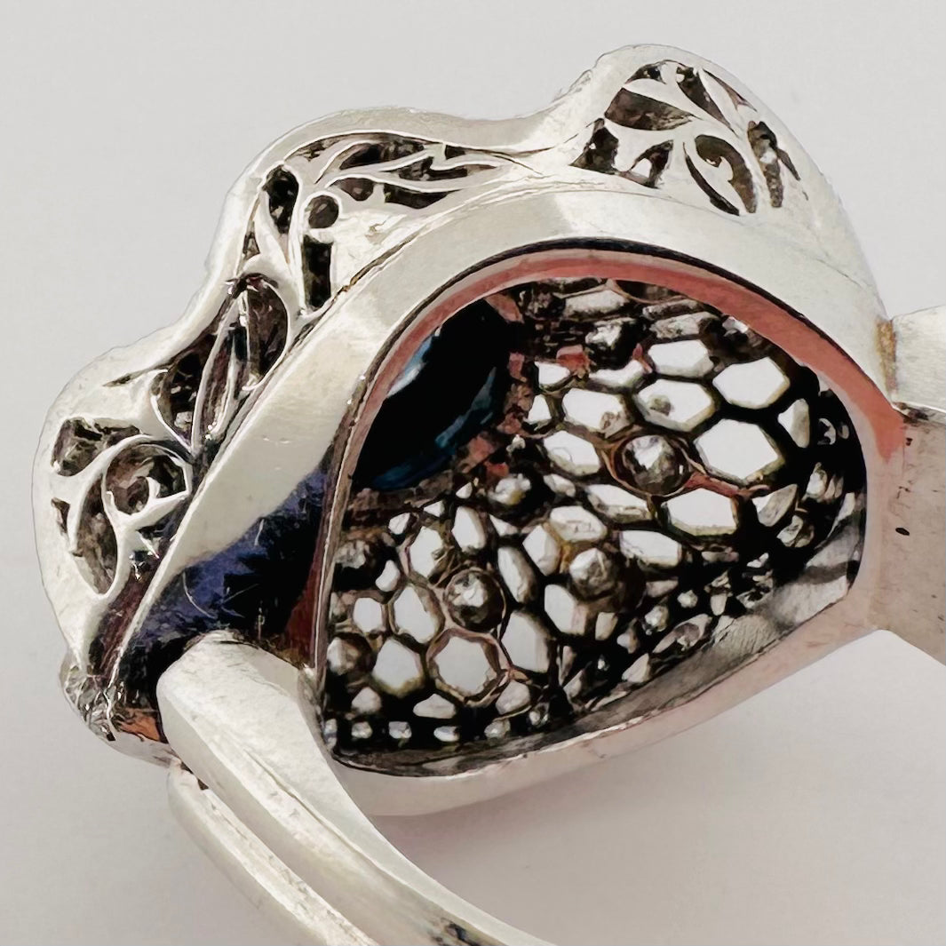 Platinum, sapphire and diamond petticoat ring