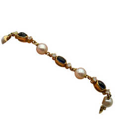 Bracelet Souple en or jaune, perles, saphir et diamants