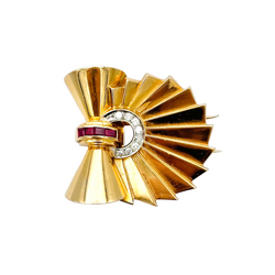 Broche Épingle en or jaune, rubis et diamants