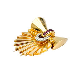Broche Épingle en or jaune, rubis et diamants