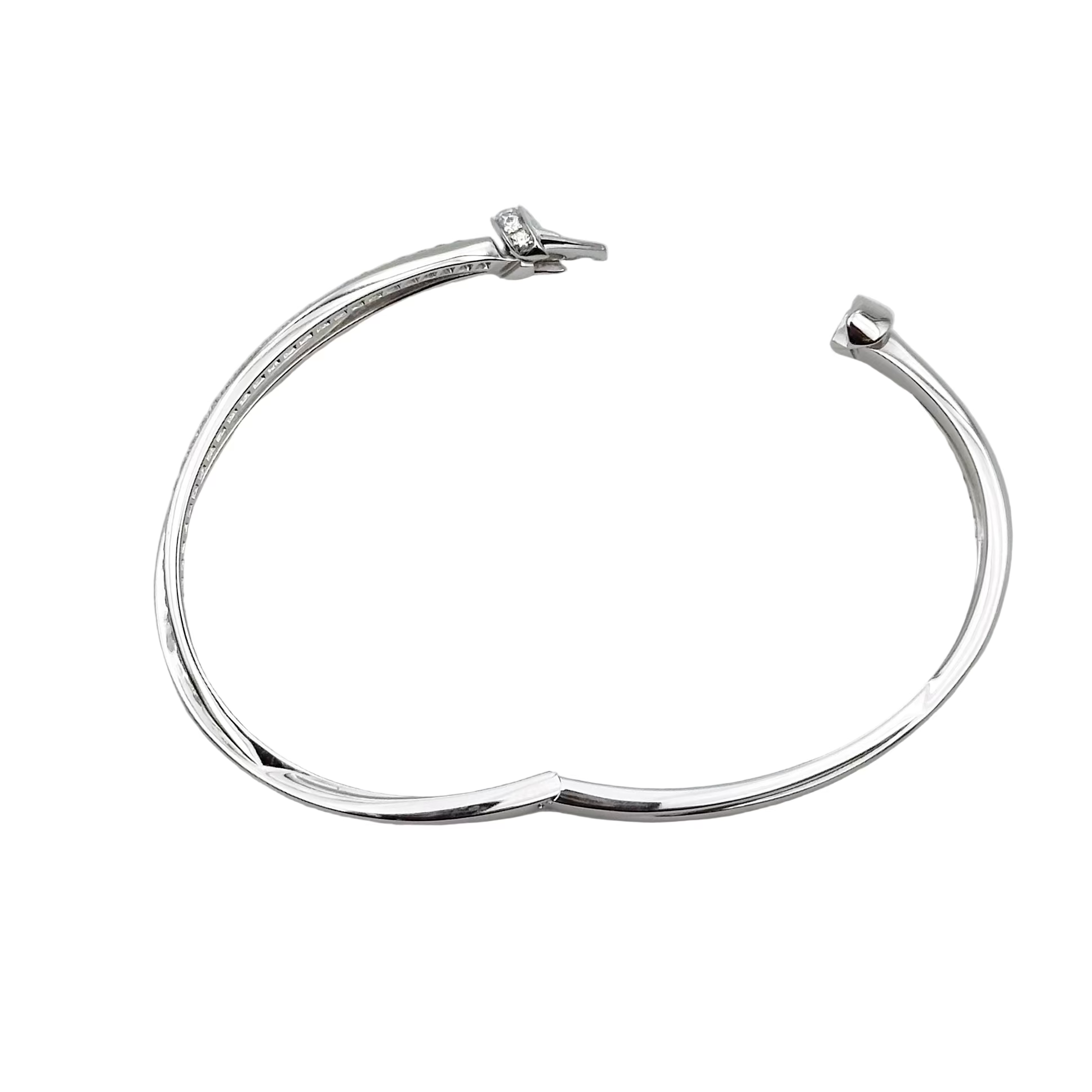 CHAUMET "Liens Séduction" bangle bracelet in white gold and diamonds