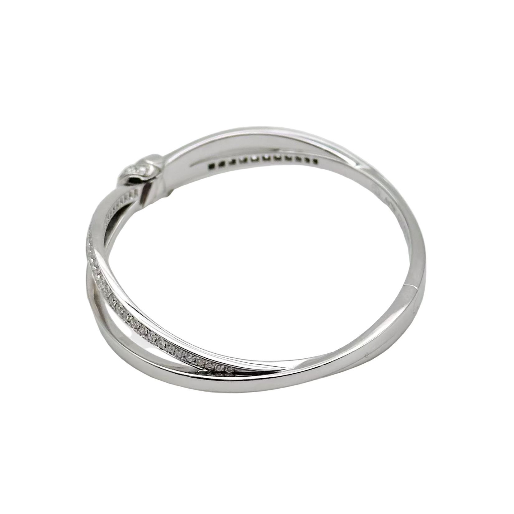 CHAUMET "Liens Séduction" bangle bracelet in white gold and diamonds
