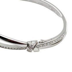 CHAUMET "Liens Séduction" bangle bracelet in white gold and diamonds