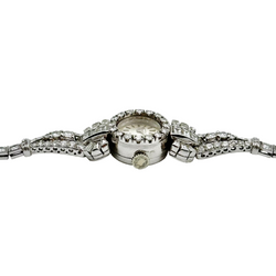 Montre Art déco LONGINES en platine, or blanc et diamants