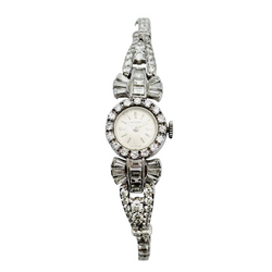Montre Art déco LONGINES en platine, or blanc et diamants