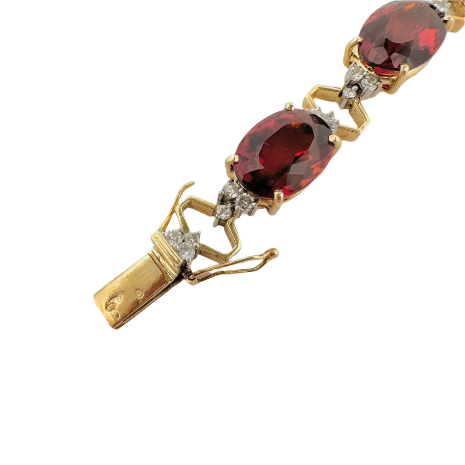 Bracelet en or jaune, platine, grenats et diamants