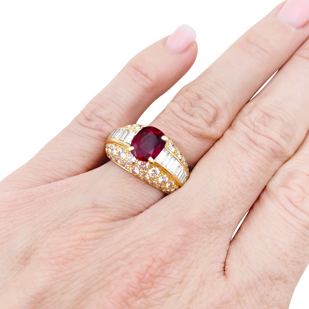 Bague Cartier "Gina" or jaune, diamants, rubis.