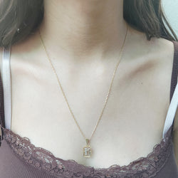 “M” Pendant in White gold, Yellow gold, and Diamonds