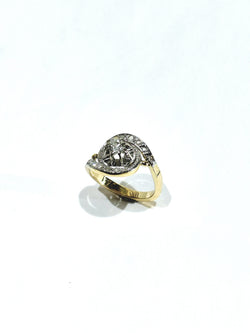 Tourbillon ring in yellow gold, white gold, and diamonds