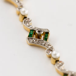 Art Deco bracelet in yellow gold, platinum, pearls, emeralds, and diamonds