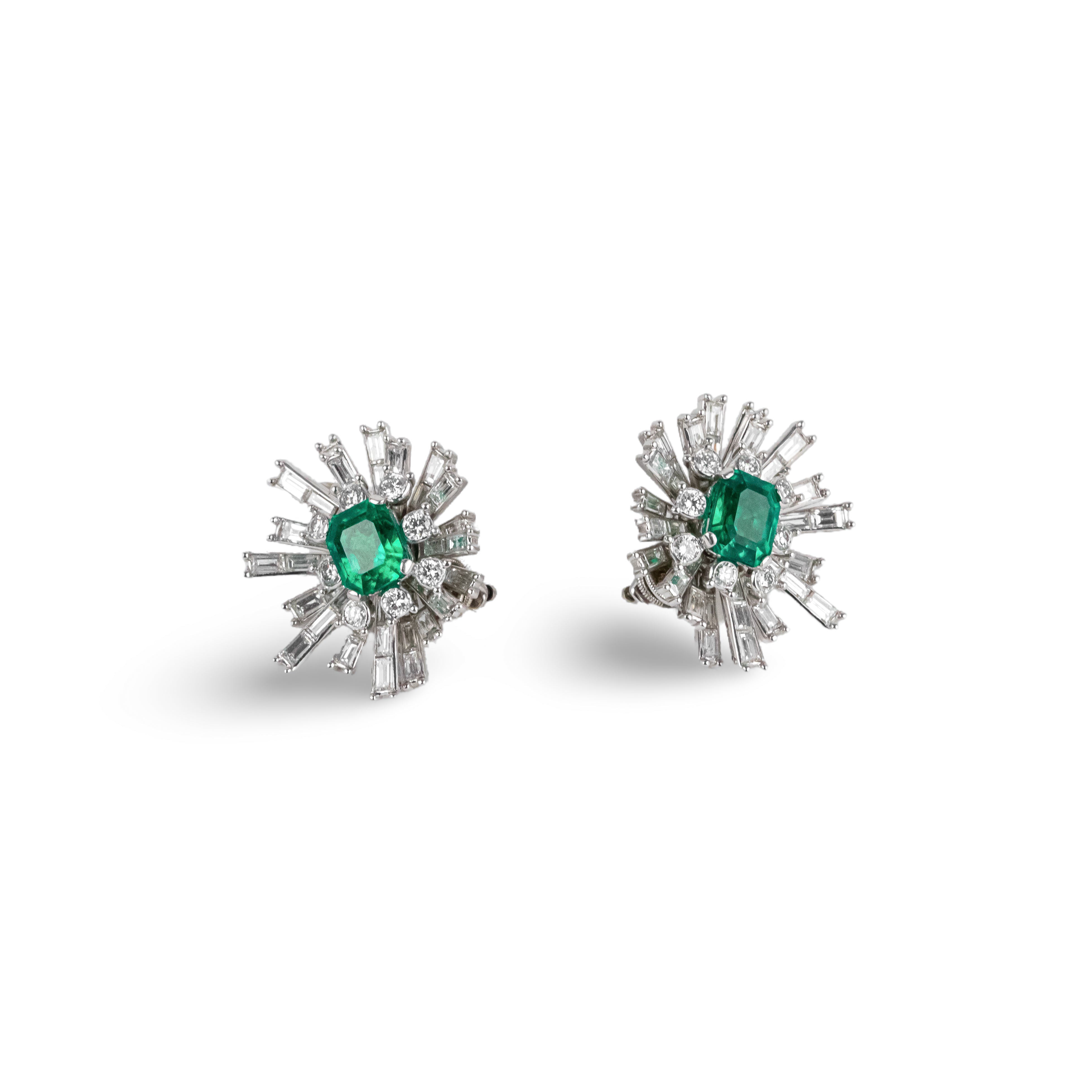 Clip-on earrings in white gold, platinum, Colombian emeralds, and diamonds
