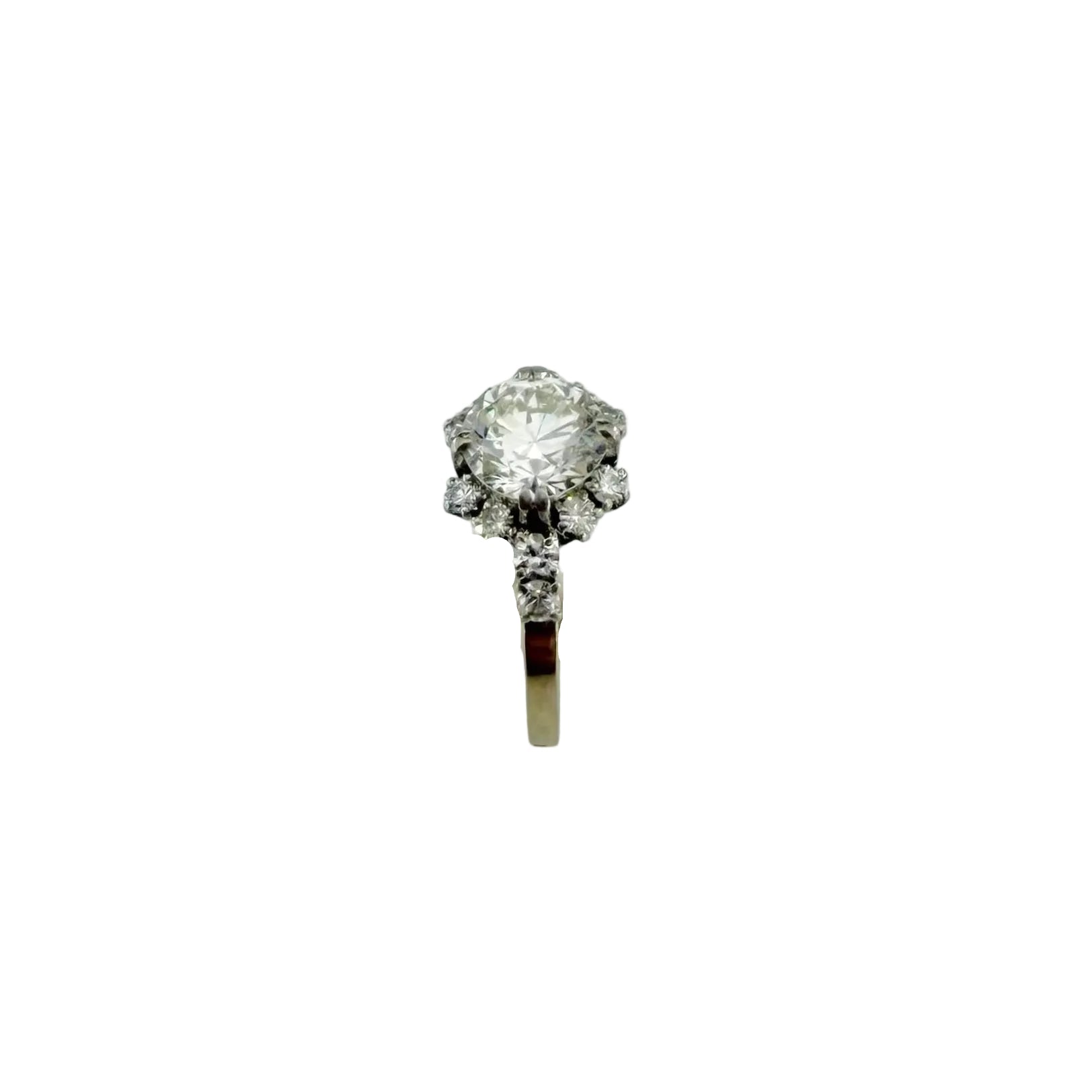 Solitaire Ring in Platinum, White Gold, and Diamonds