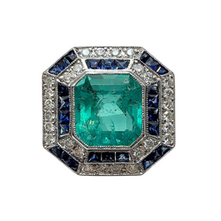 Entourage Ring in white gold, emerald, sapphire, and diamonds