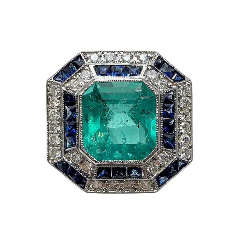 Entourage Ring in white gold, emerald, sapphire, and diamonds