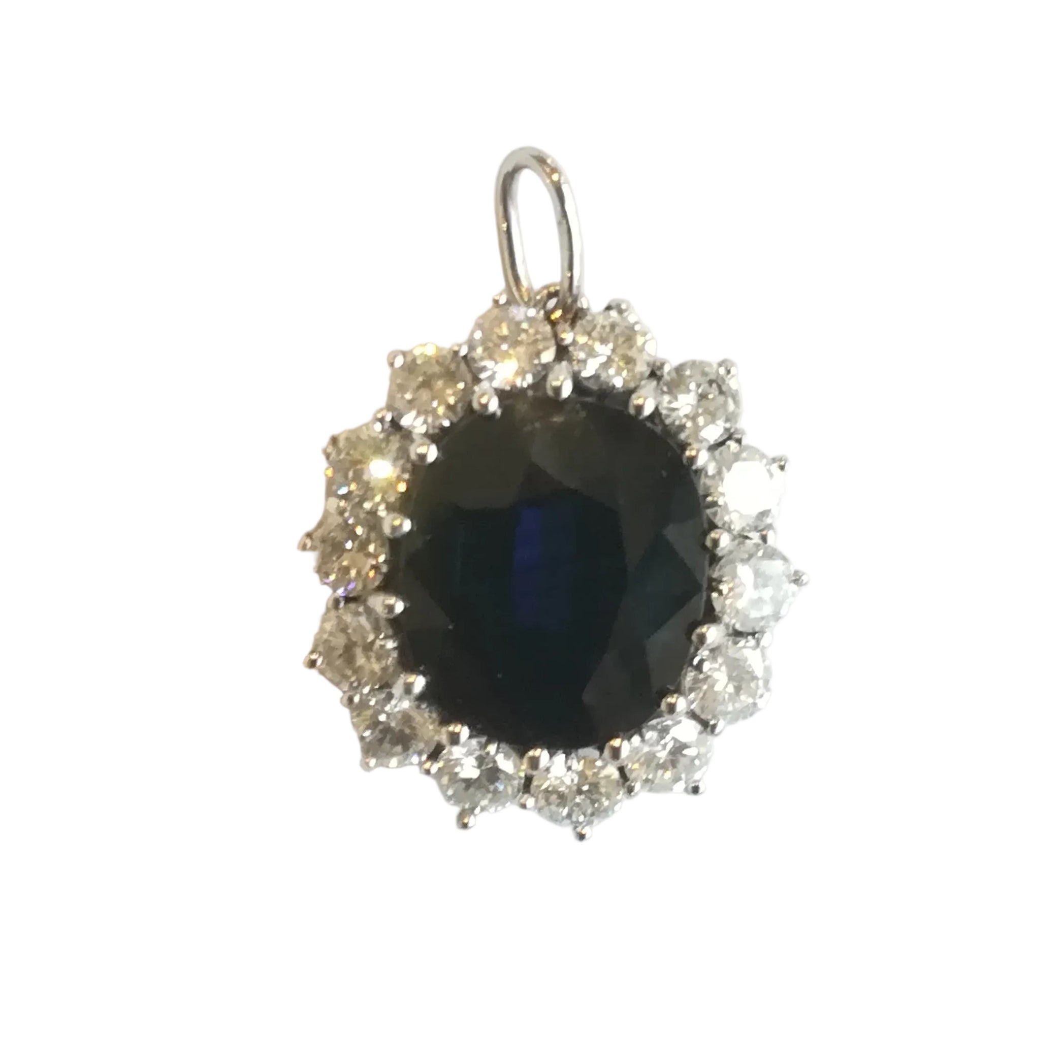 White gold, sapphire, and diamond pendant