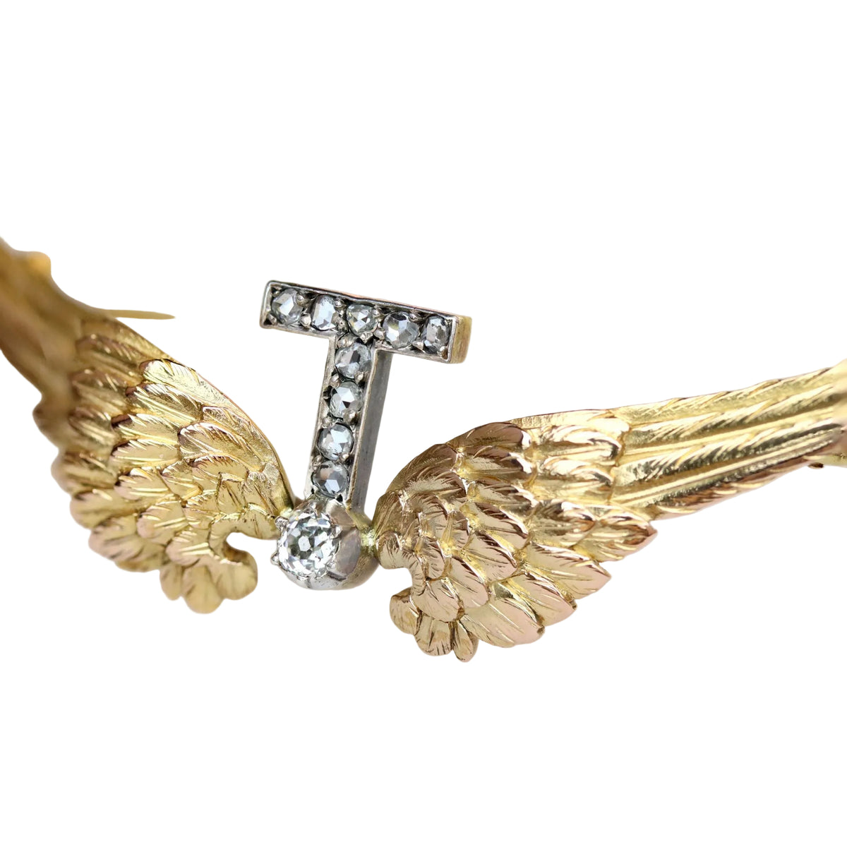 Yellow gold, silver, and diamond brooch