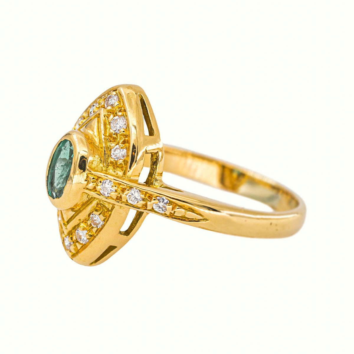 Marquise Ring in Yellow Gold with an Emerald