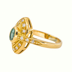 Marquise Ring in Yellow Gold with an Emerald