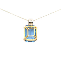 Yellow gold pendant with topaz and diamonds
