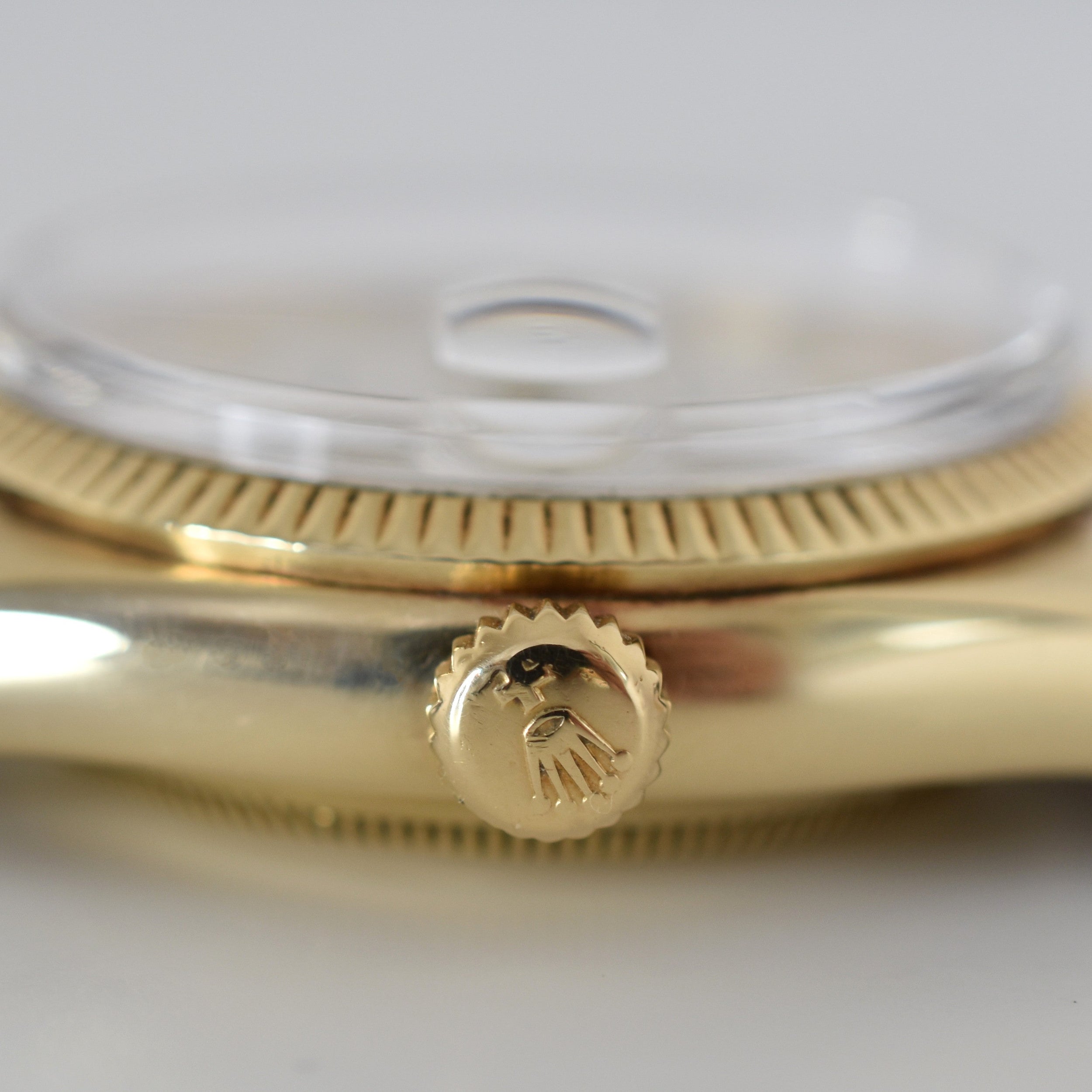 ROLEX "Oyster Perpetual Date Ovettone" watch in yellow gold and leather