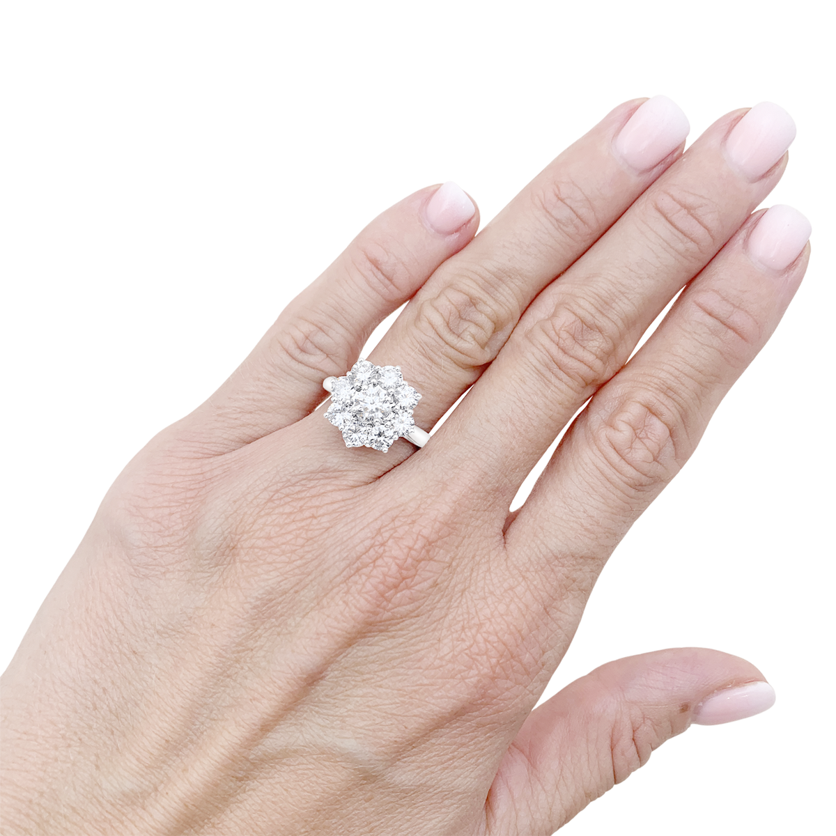 Bague Marguerite en or blanc et platine, sertie de diamants.