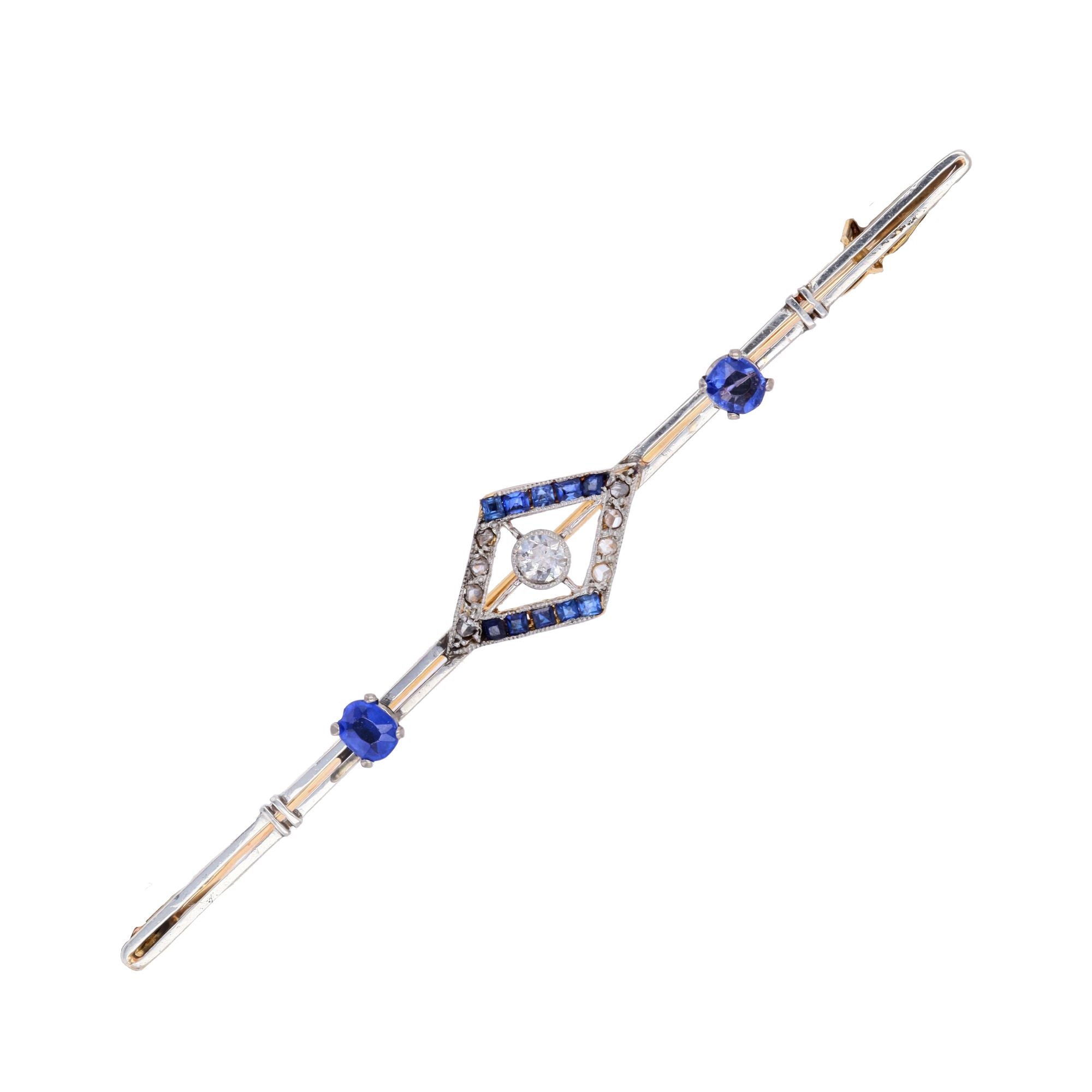 Broche Barrette en or jaune, platine, saphirs et diamants