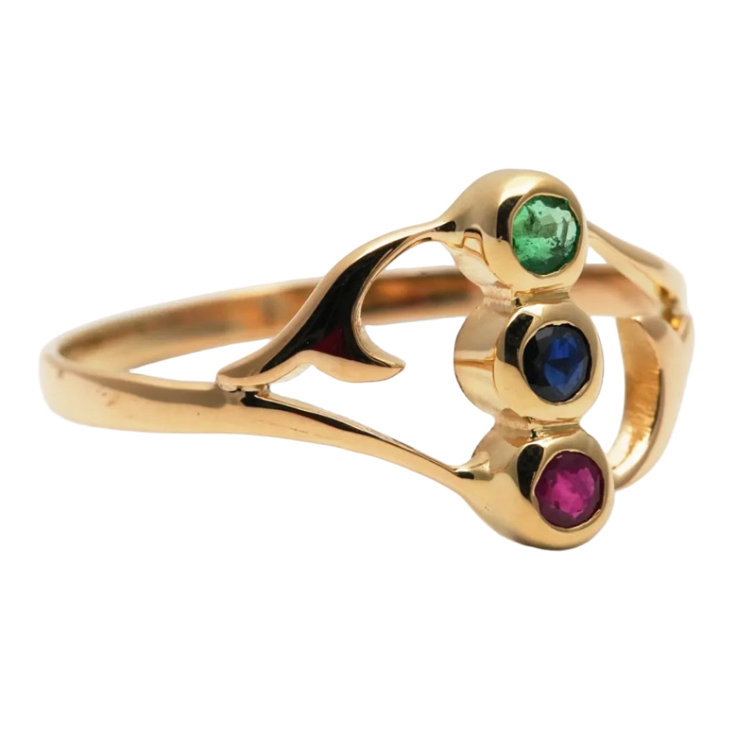 Trilogy Ring in yellow gold, emerald, sapphire, and ruby