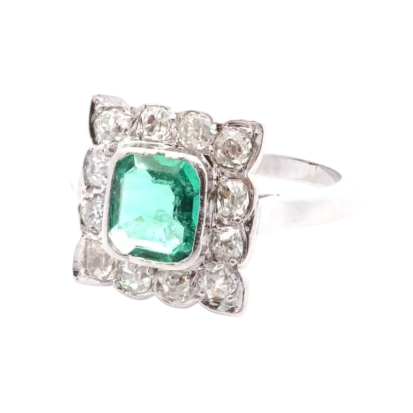 "Entourage" Ring in White Gold, Emerald, and Diamonds