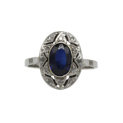 Entourage Ring in white gold, platinum, sapphire, and diamonds
