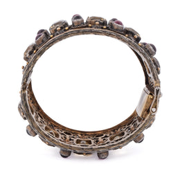 Cuff bracelet in yellow gold, silver, beryls, and garnets