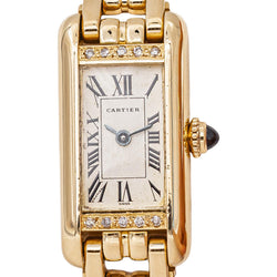 Montre CARTIER Tank Mini en or jaune et diamants