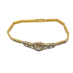 White gold, yellow gold, and diamond bracelet