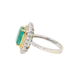 Entourage Ring in white gold, yellow gold, Emerald, and Diamonds