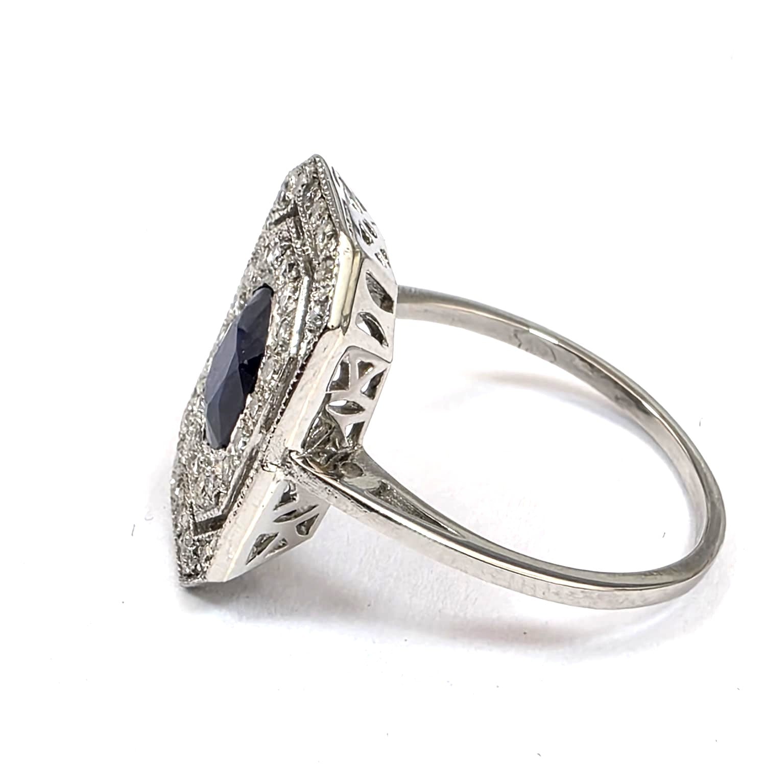 "Entourage" Ring in White Gold, Sapphire, and Diamonds