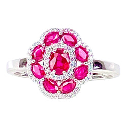 Bague Entourage en or blanc, rubis et diamants