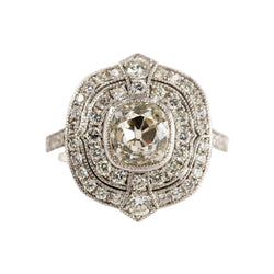 Entourage Ring in white gold, Platinum, and Diamonds