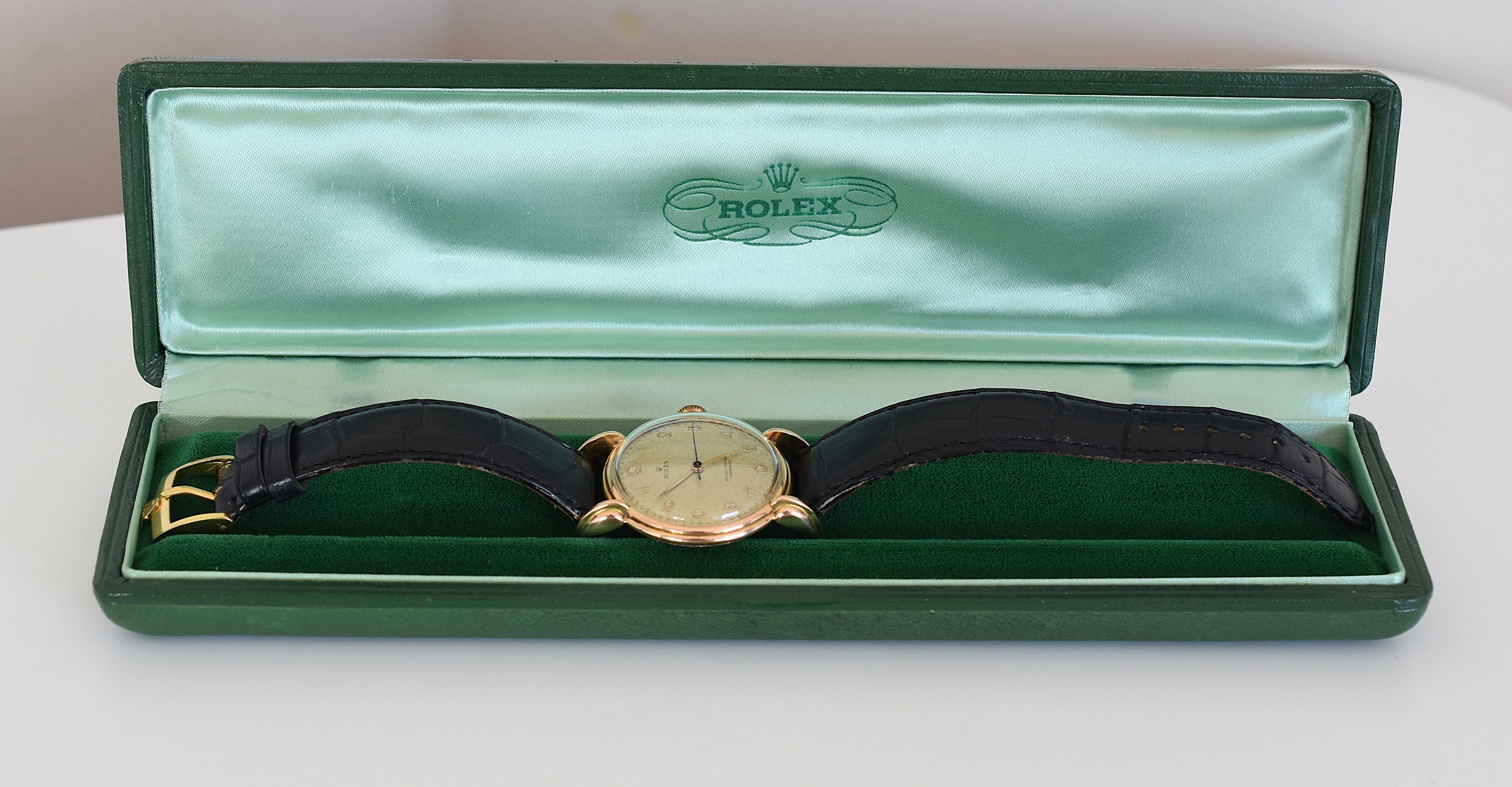 ROLEX "Chronometer" watch in rose gold, steel, and leather