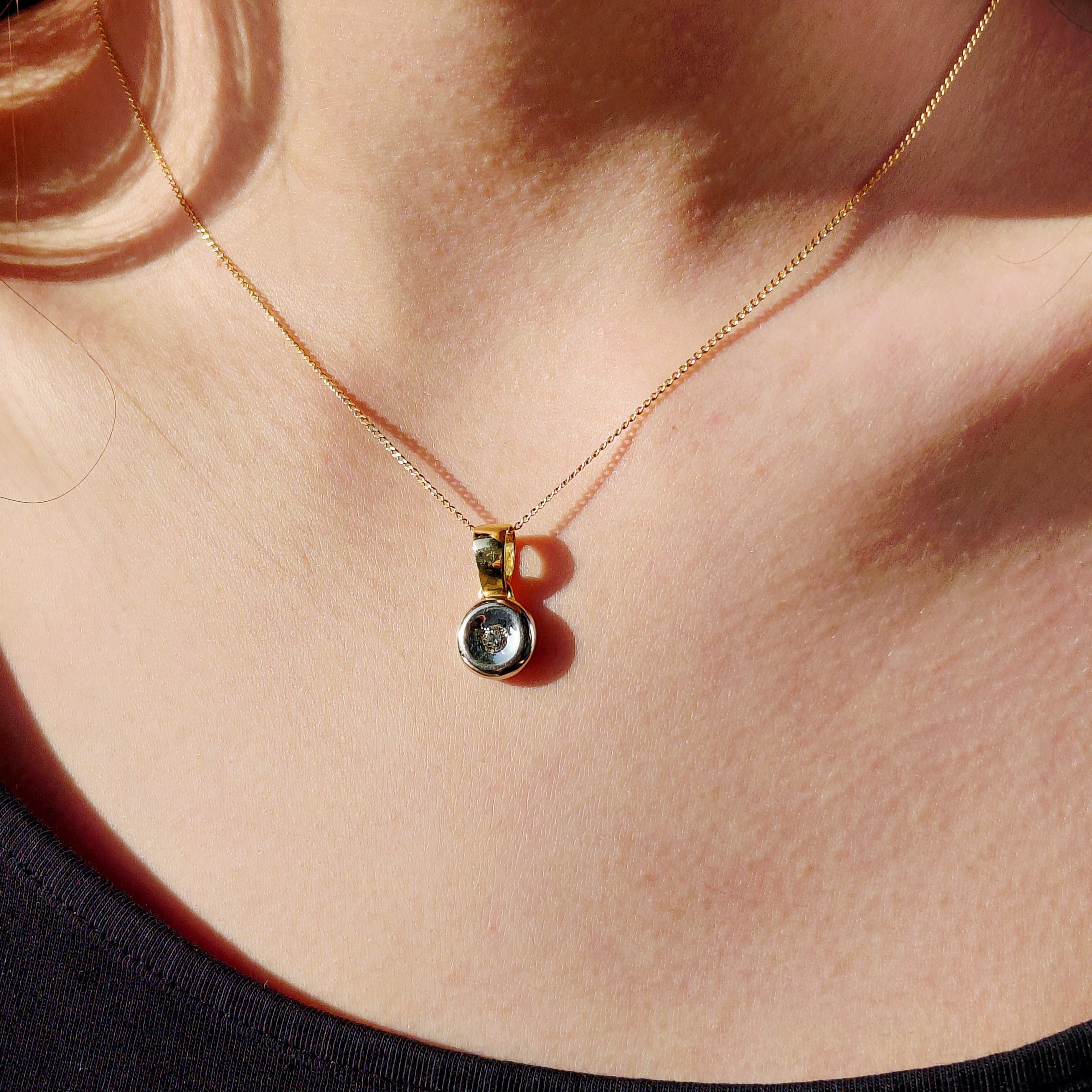 Pendentif en or jaune, or blanc et diamant