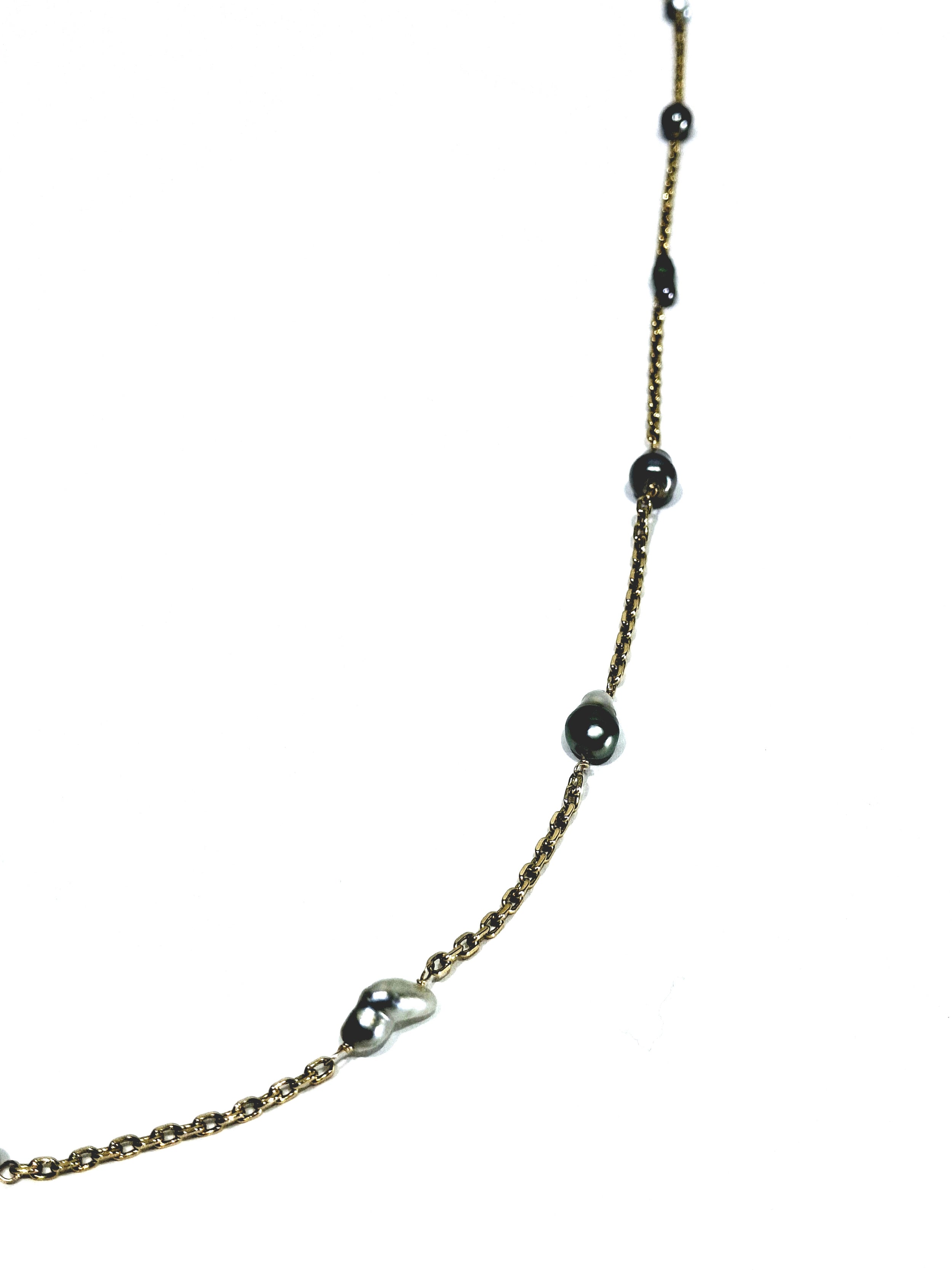 Rose gold long necklace with Tahitian pearls.
